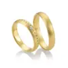 Alianzas de boda de oro amarillo con diamante