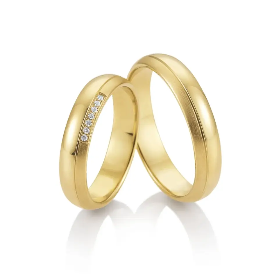 Alianzas de boda de oro amarillo con diamantes