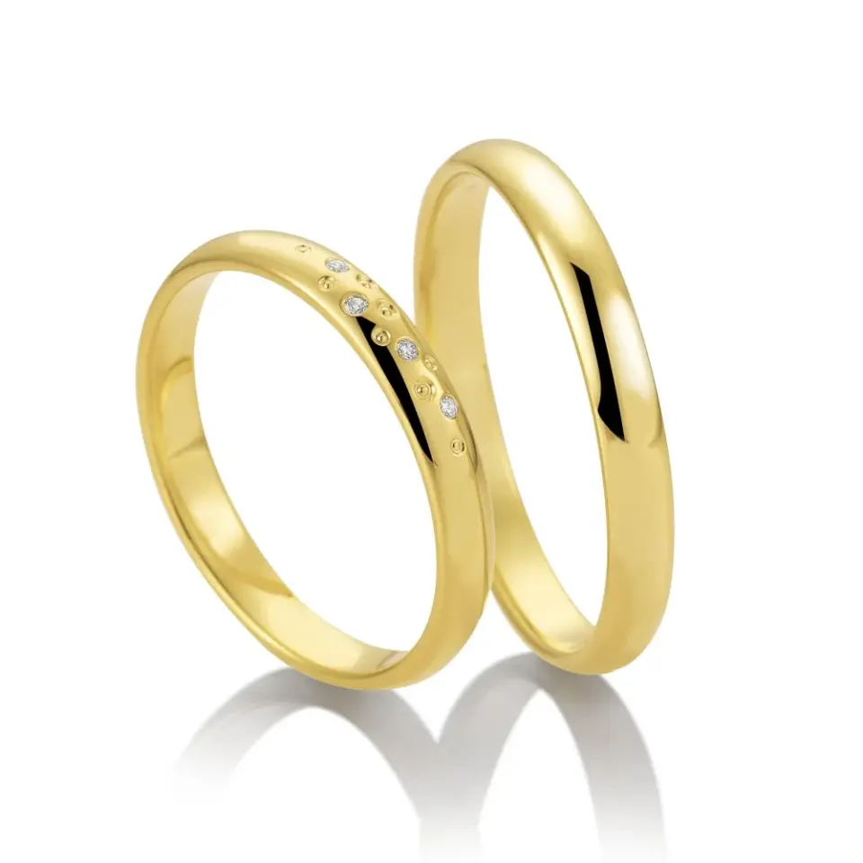 Alianzas de boda de oro amarillo con diamantes