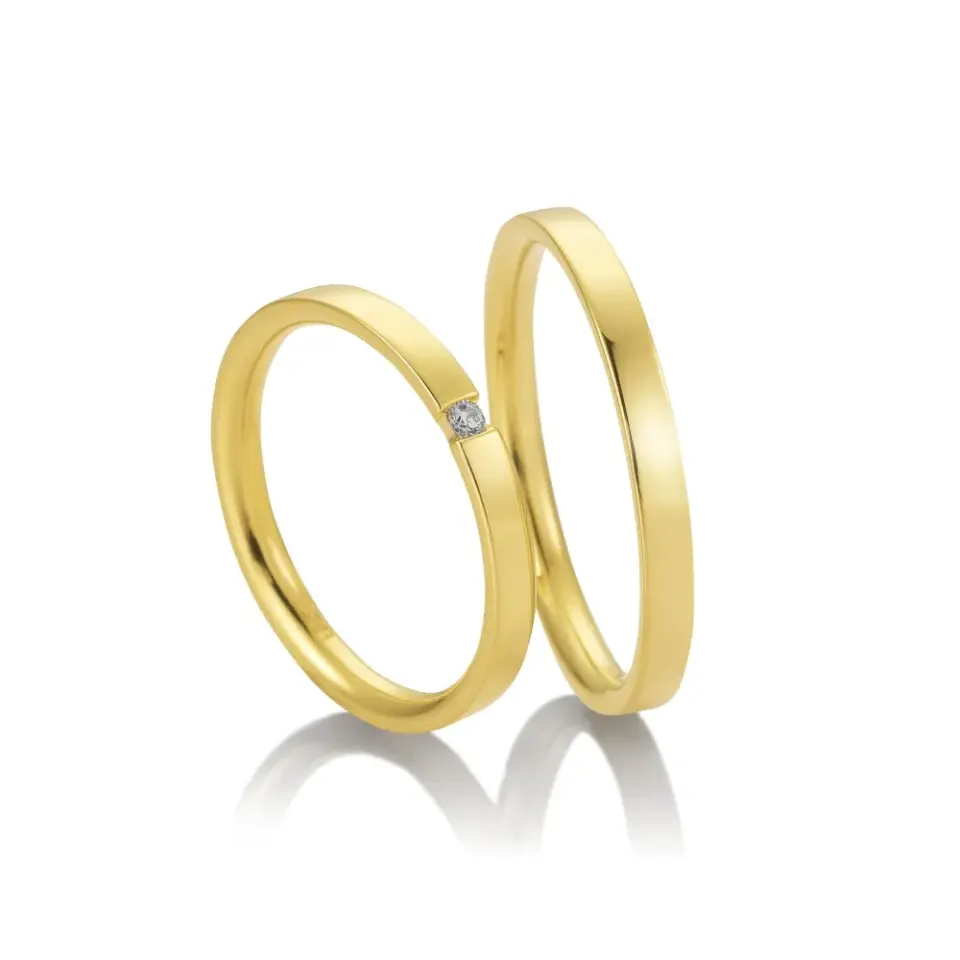 Alianzas de boda de oro amarillo con diamante