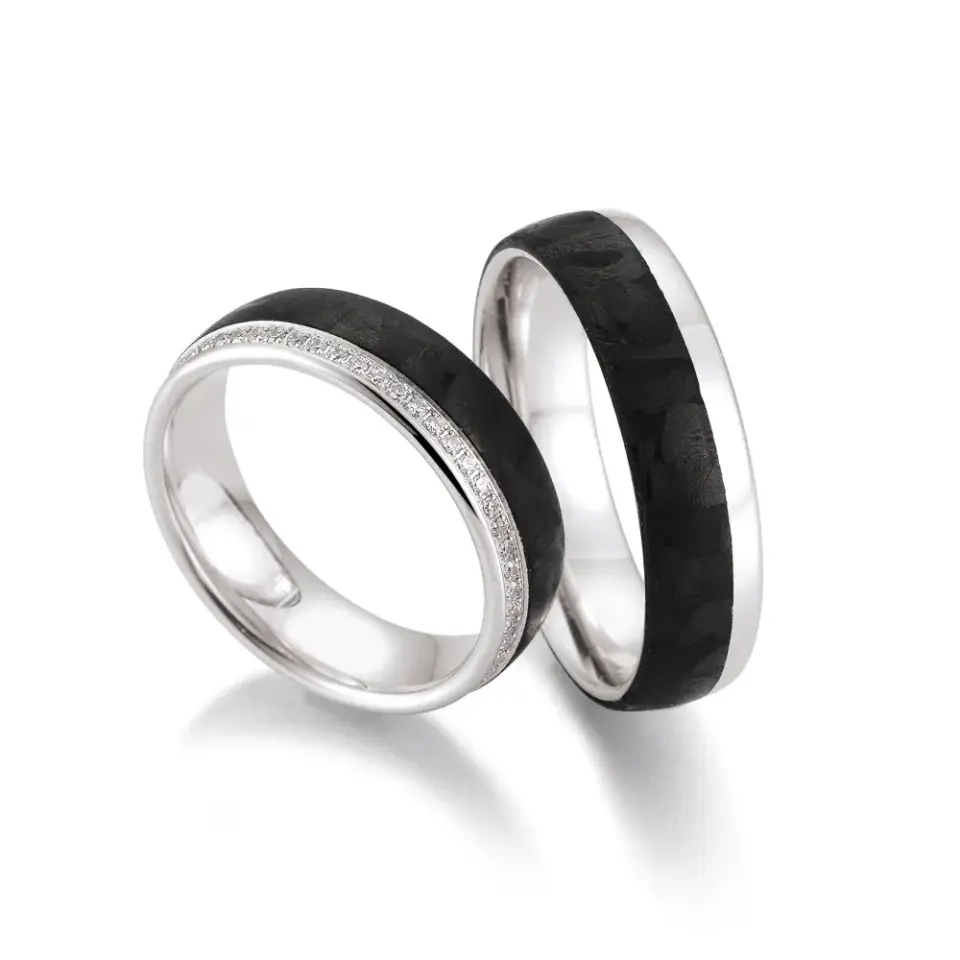 Alianzas de boda de paladio y carbono con diamantes