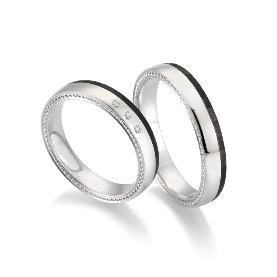 Alianzas de boda de paladio y carbono con diamantes