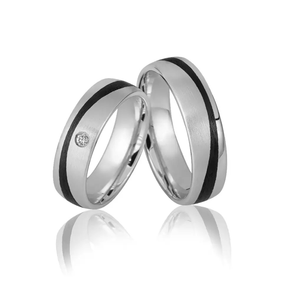 Alianzas de boda de paladio y carbono con diamante
