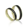 Alianzas de boda de oro amarillo y carbono con diamantes