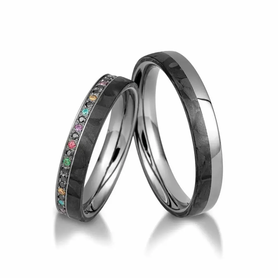 Alianzas de boda de oro gris y carbono con diamantes