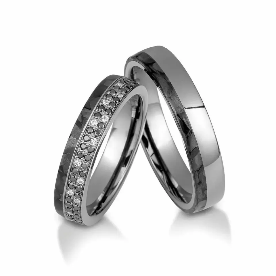 Alianzas de boda de oro gris y carbono con diamantes