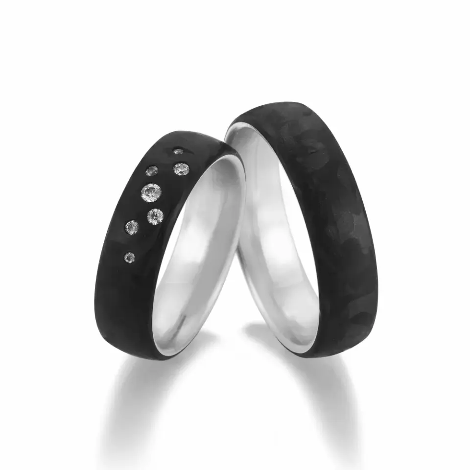 Alianzas de boda de paladio y carbono con diamantes
