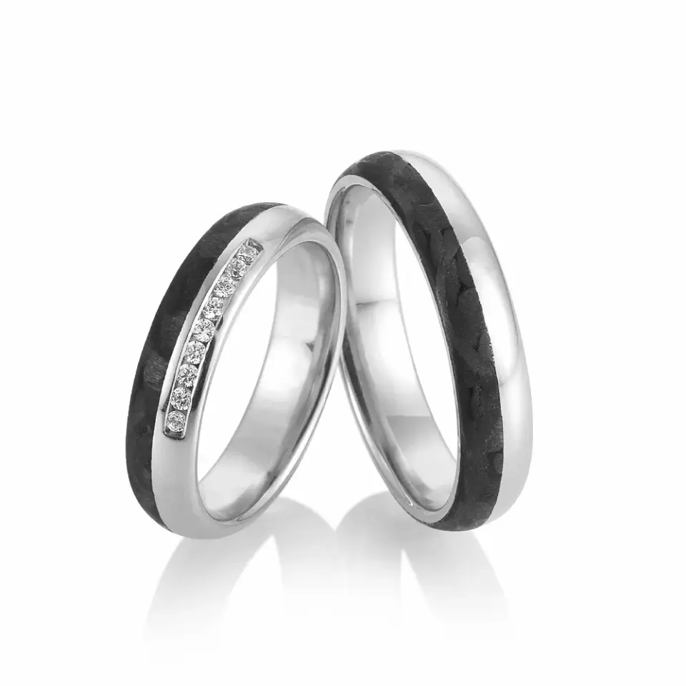 Alianzas de boda de paladio y carbono con diamantes