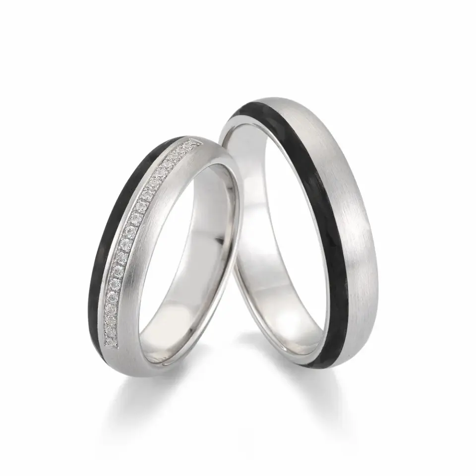 Alianzas de boda de paladio y carbono con diamantes