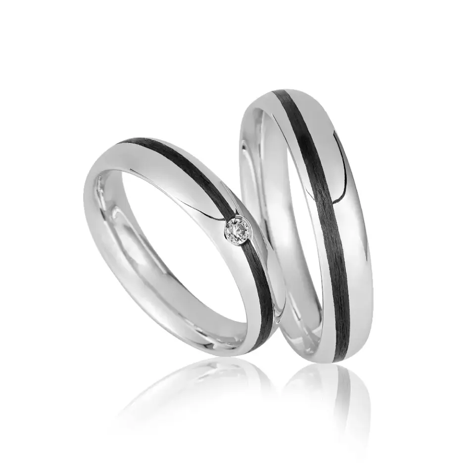 Alianzas de boda de oro blanco y carbono con diamante