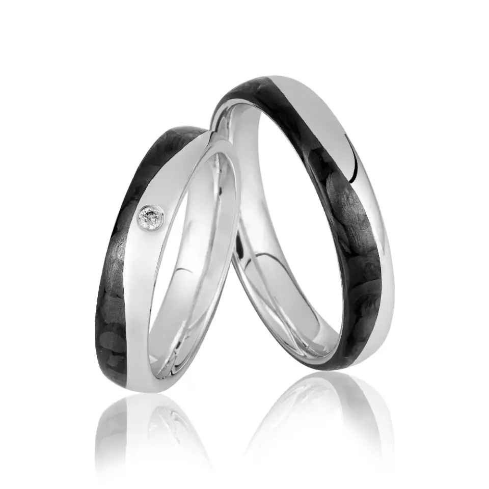 Alianzas de boda de oro blanco y carbono con diamante