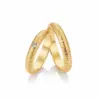 Alianzas de boda de oro amarillo con diamante