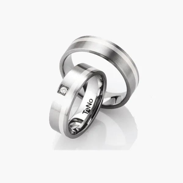 Alianzas de boda de acero y plata con diamante