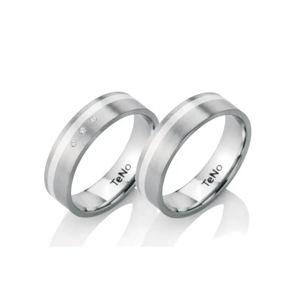 Alianzas de boda de acero y plata con diamantes