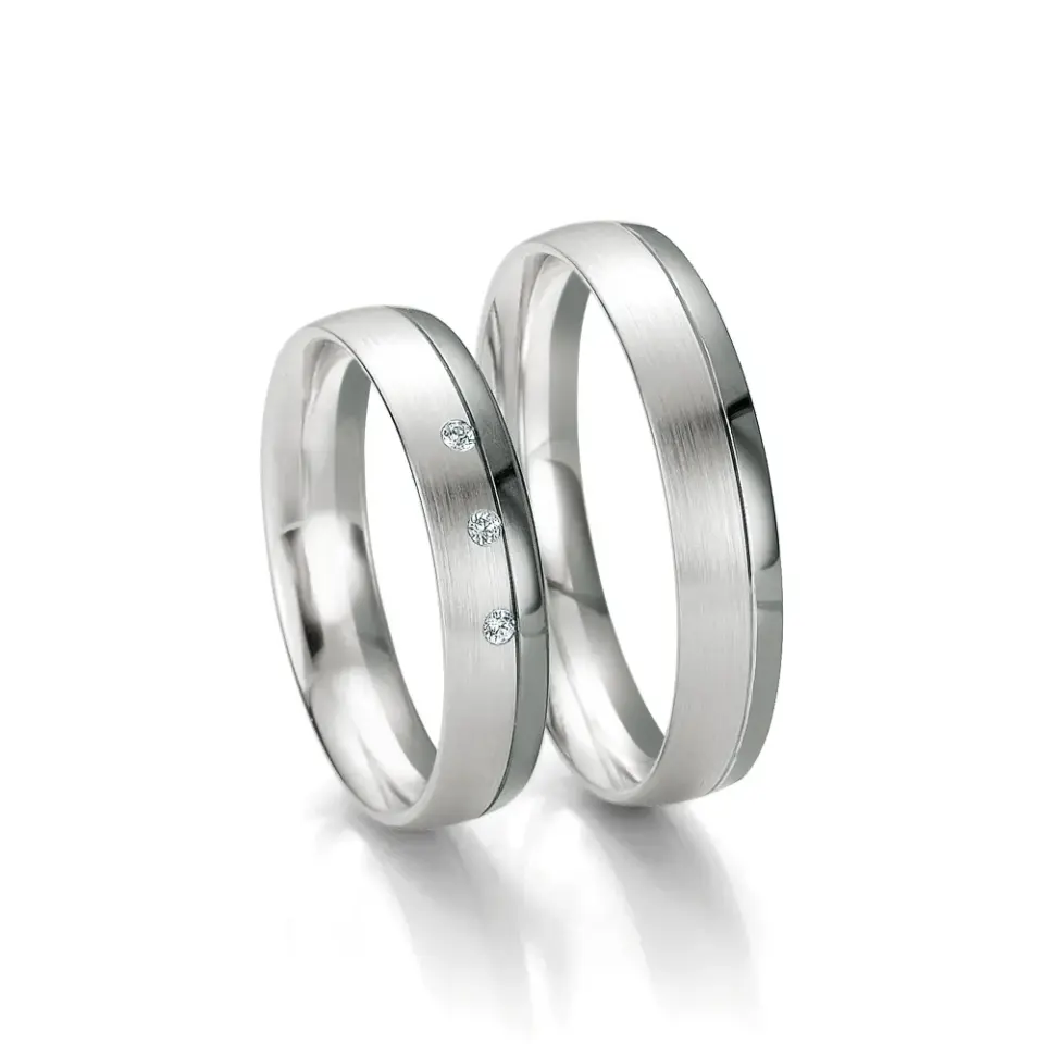 Alianzas de boda de oro blanco y oro gris con diamantes