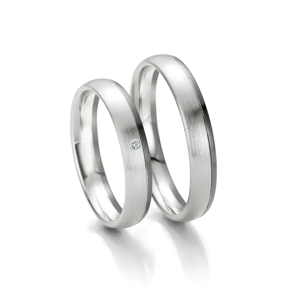 Alianzas de boda de oro blanco y oro gris con diamante