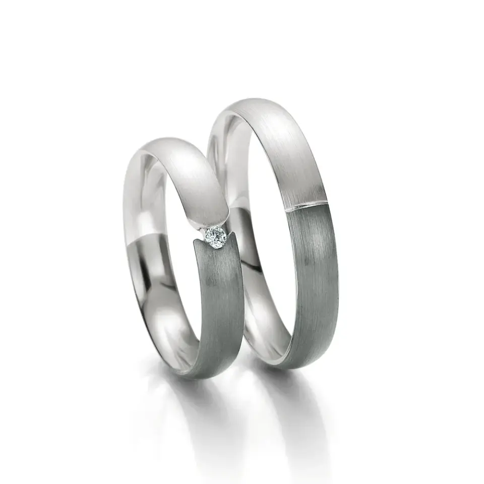 Alianzas de boda de oro blanco y oro gris con diamante