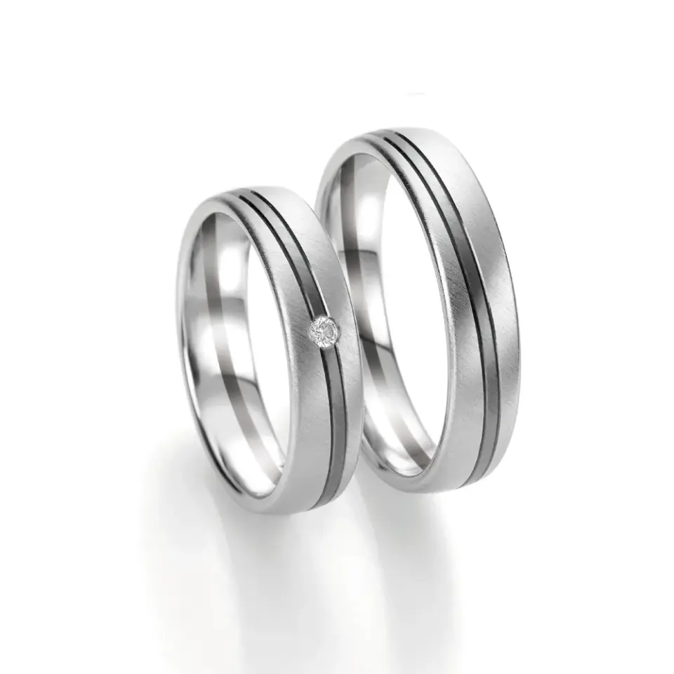 Alianzas de boda de oro blanco y oro gris con diamante