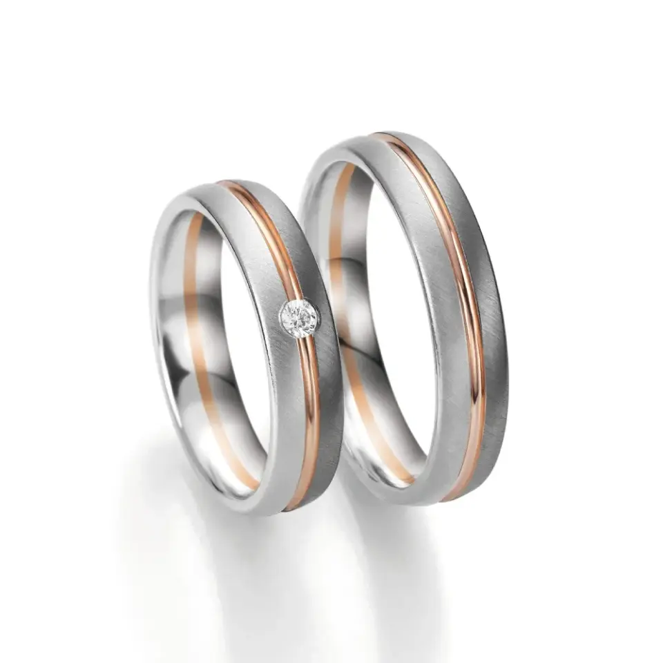 Alianzas de boda de oro blanco y oro gris con diamante