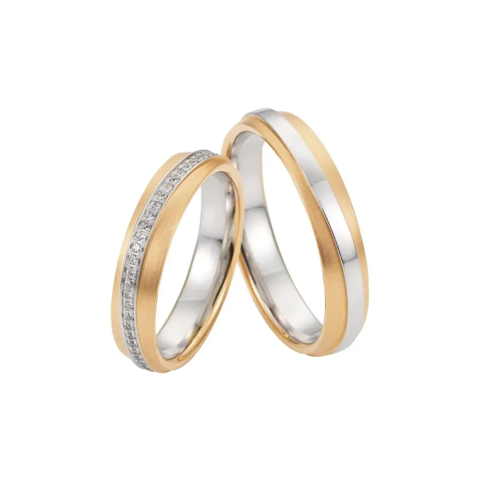 Alianzas de boda de oro amarillo y oro blanco con diamantes