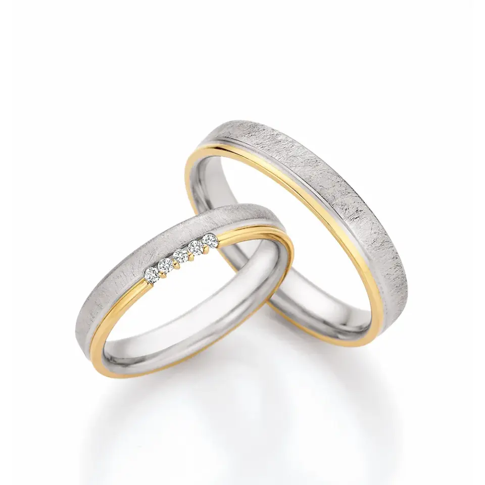 Alianzas de boda de paladio y oro amarillo con diamantes