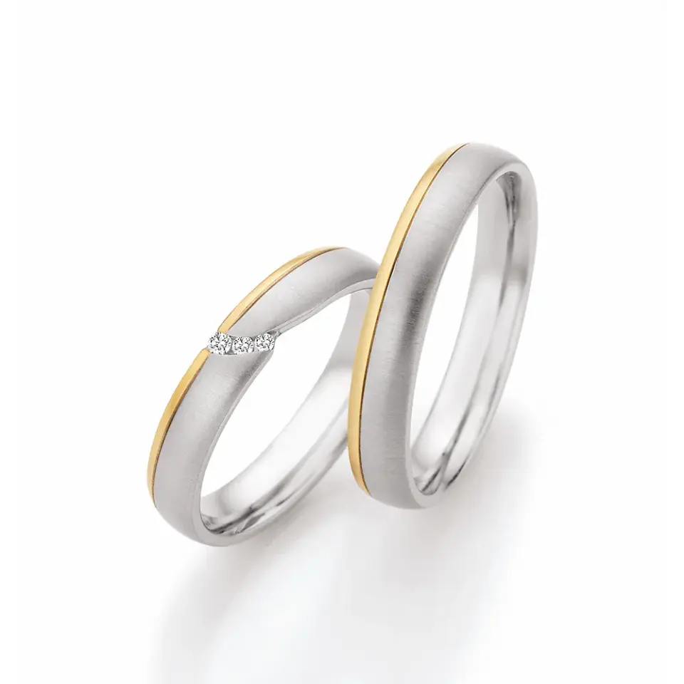 Alianzas de boda de paladio y oro amarillo con diamantes