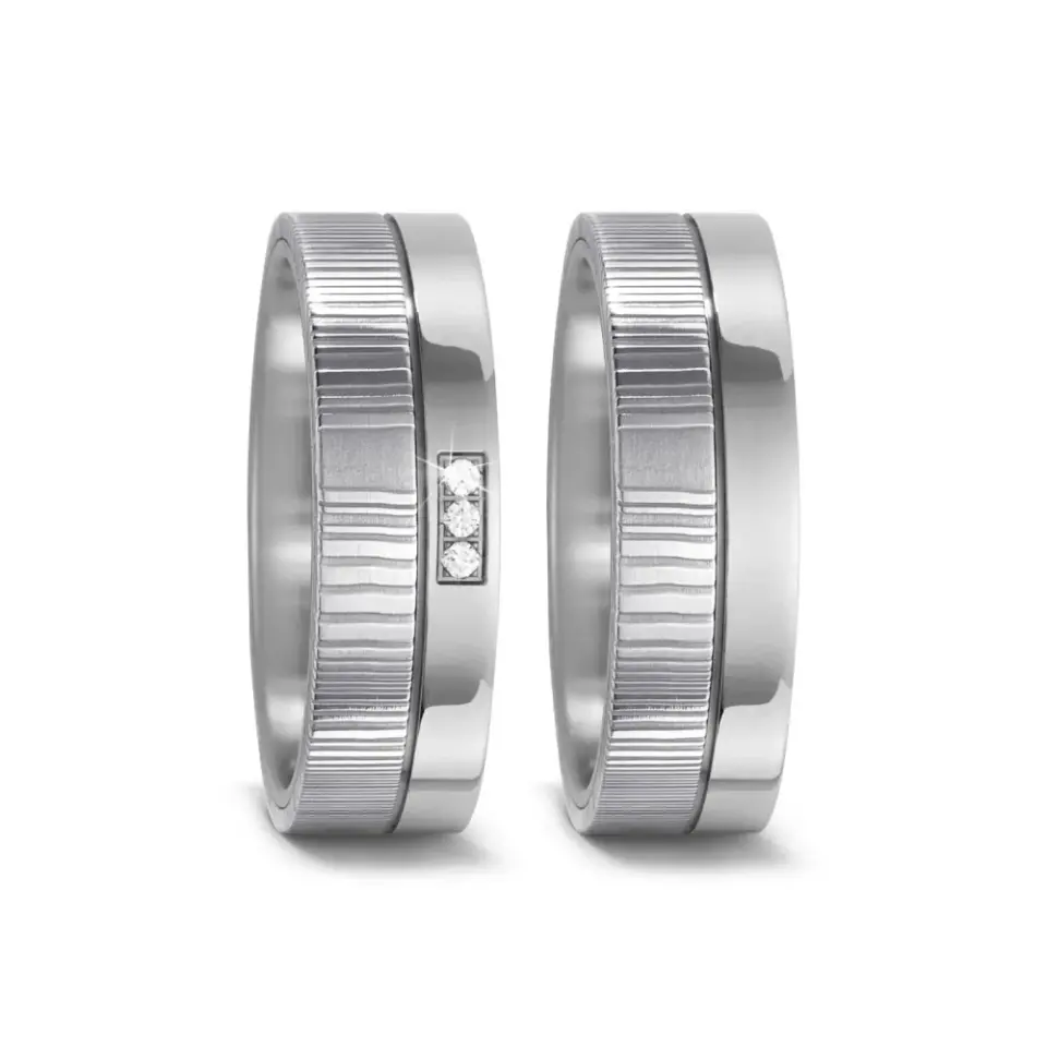 Alianzas de boda de acero damasquino con diamante