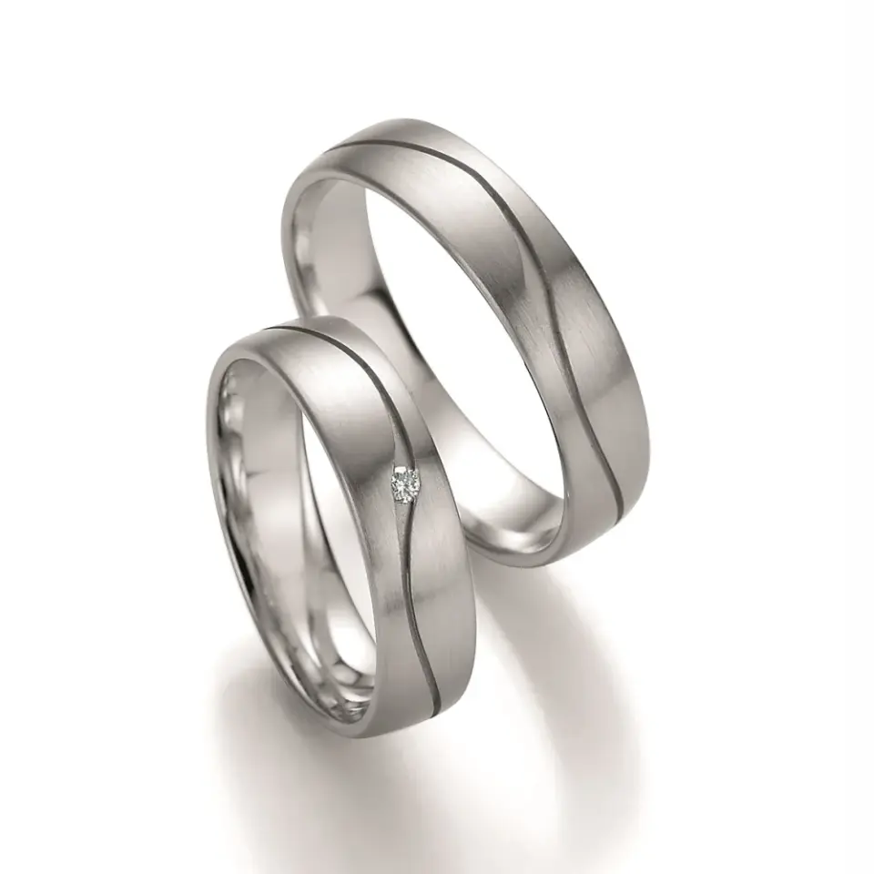 Alianzas de boda de oro blanco con diamante