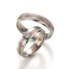 Alianzas de boda de paladio y oro rosado con diamante