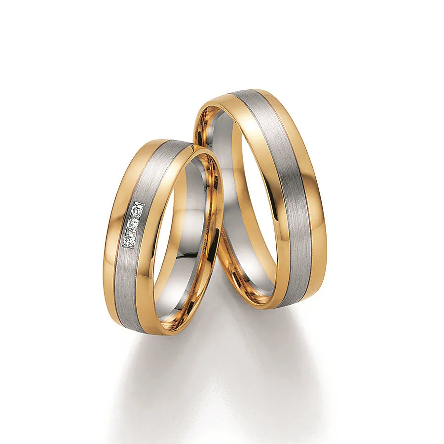Alianzas de boda de oro amarillo y paladio con diamantes