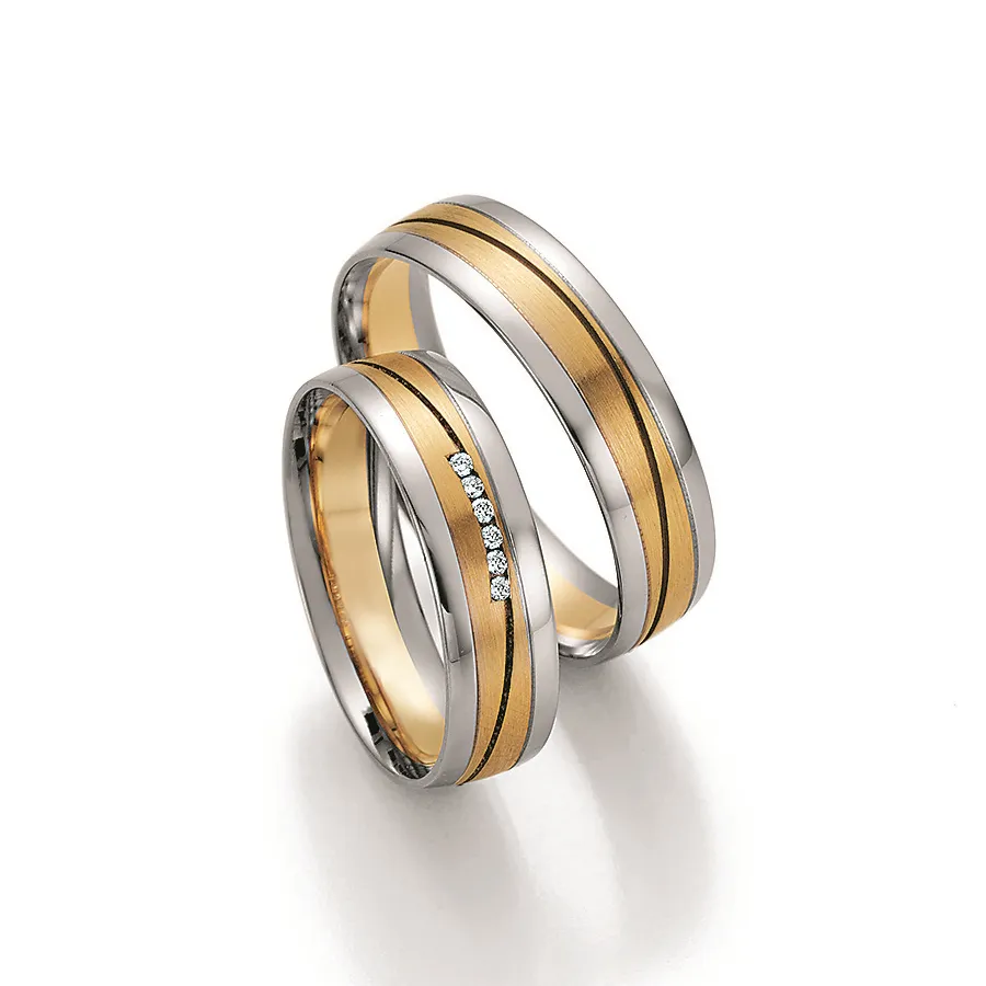 Alianzas de boda de paladio y oro amarillo con diamantes