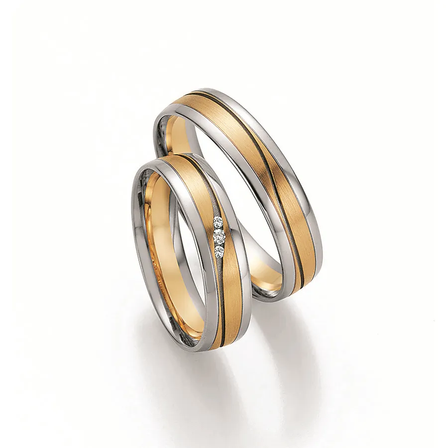 Alianzas de boda de paladio y oro amarillo con diamantes