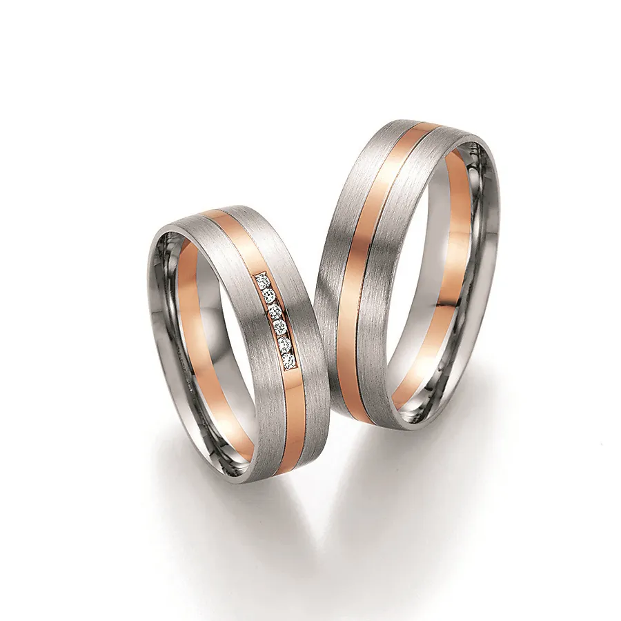 Alianzas de boda de oro blanco y oro rosado con diamantes