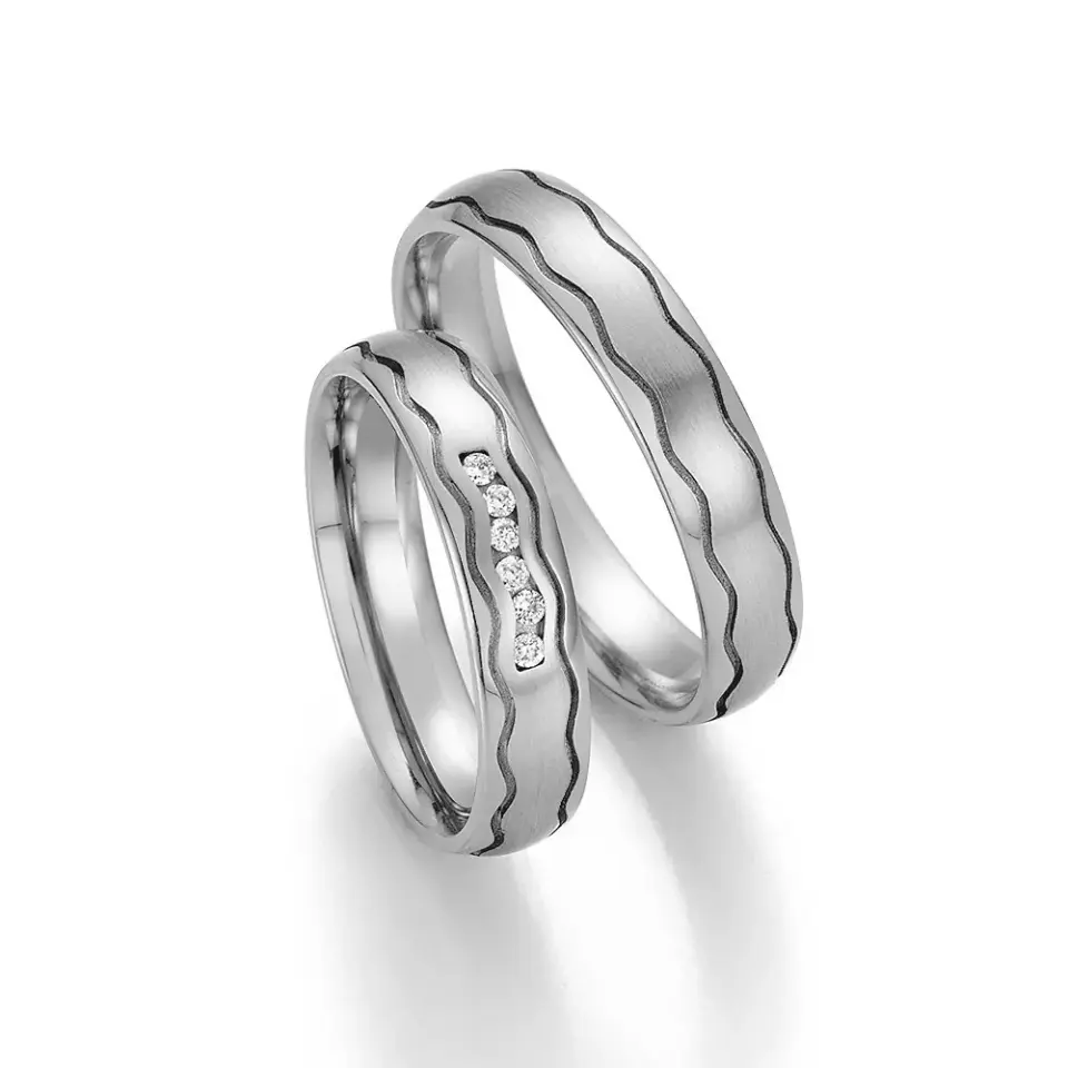 Alianzas de boda de paladio con diamantes