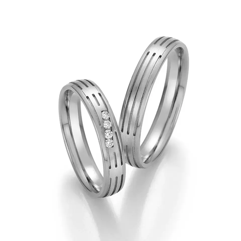 Alianzas de boda de paladio con diamantes