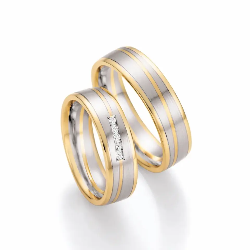Alianzas de boda de oro amarillo y platino con diamantes