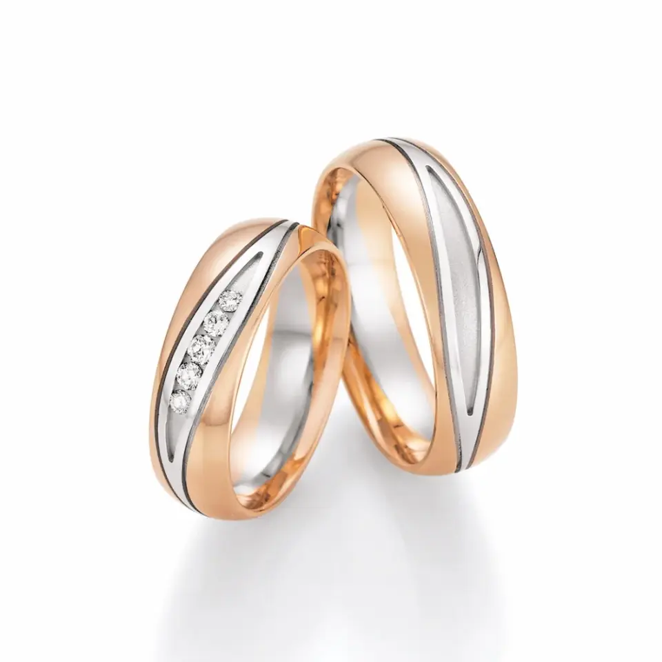 Alianzas de boda de oro rosado y oro blanco con diamantes