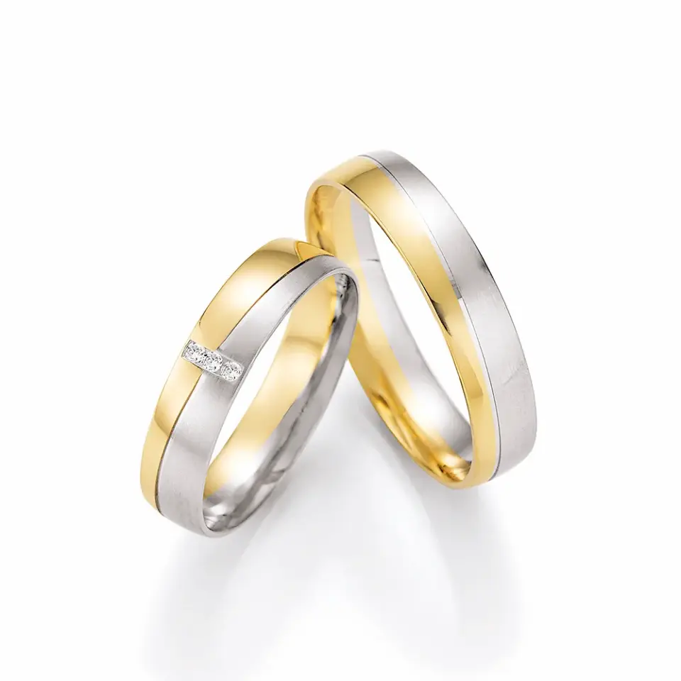 Alianzas de boda de oro amarillo y platino con diamantes