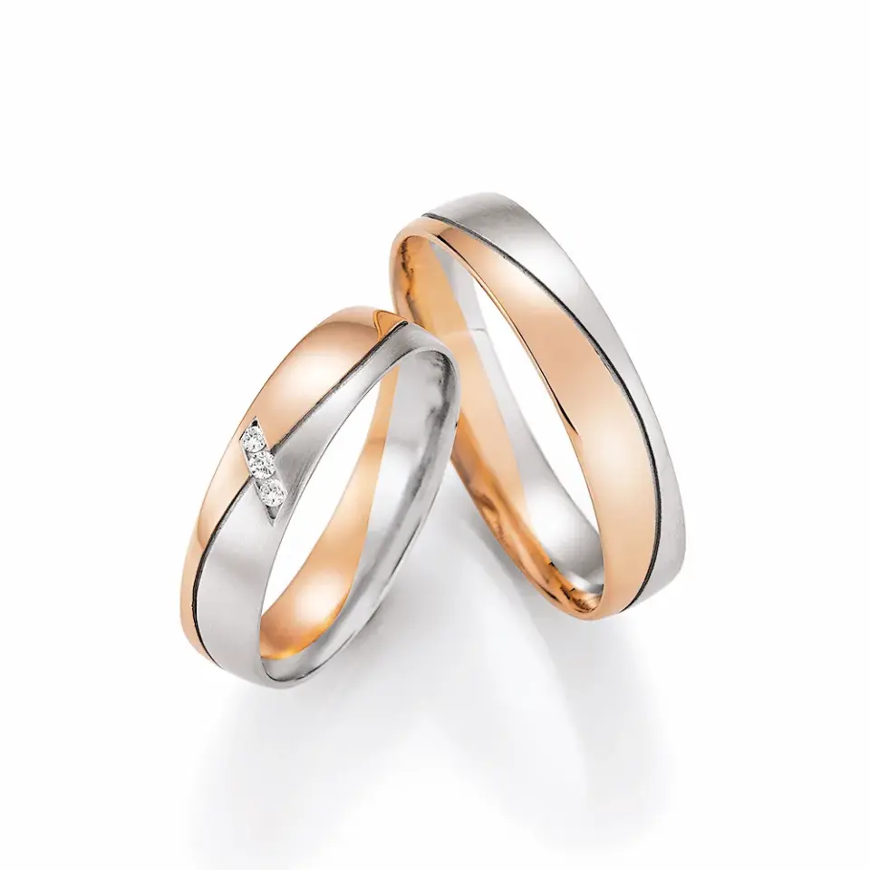 Alianzas de boda de oro blanco y oro rosado con diamantes