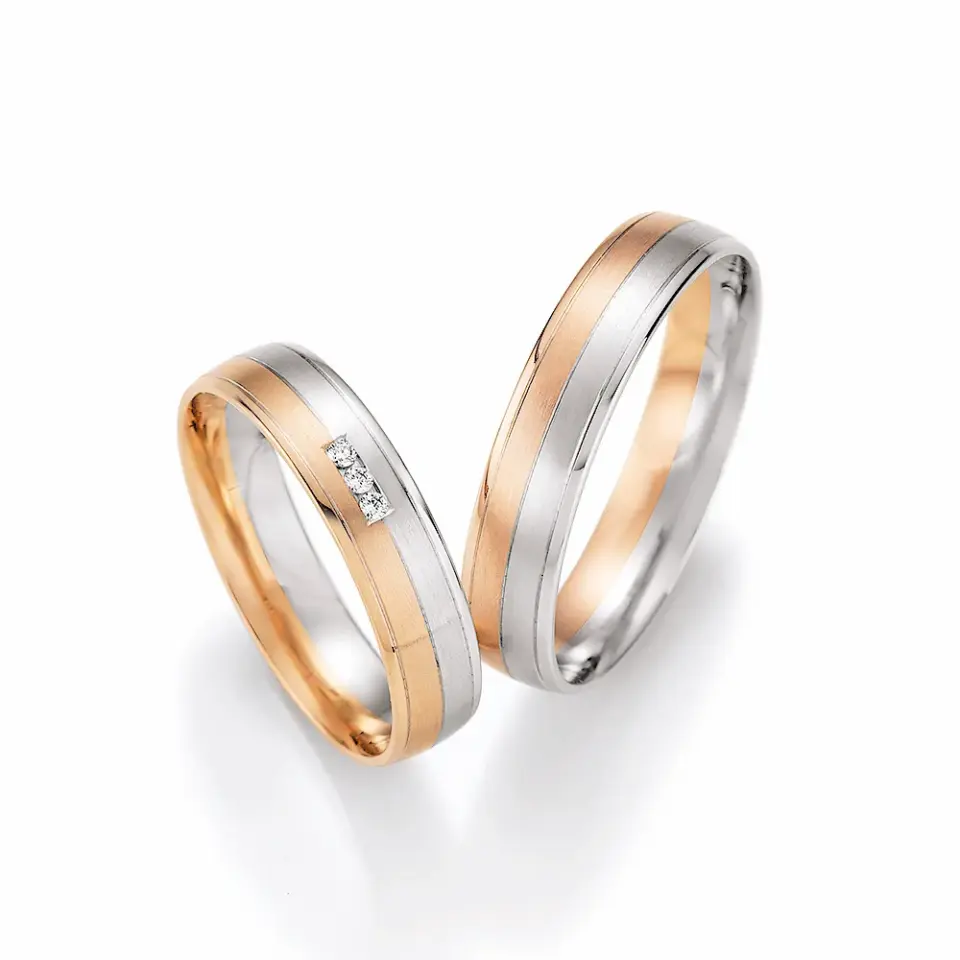 Alianzas de boda de oro blanco y oro rosado con diamantes