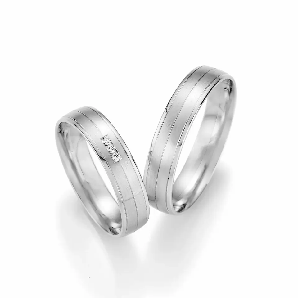 Alianzas de boda de paladio con diamantes