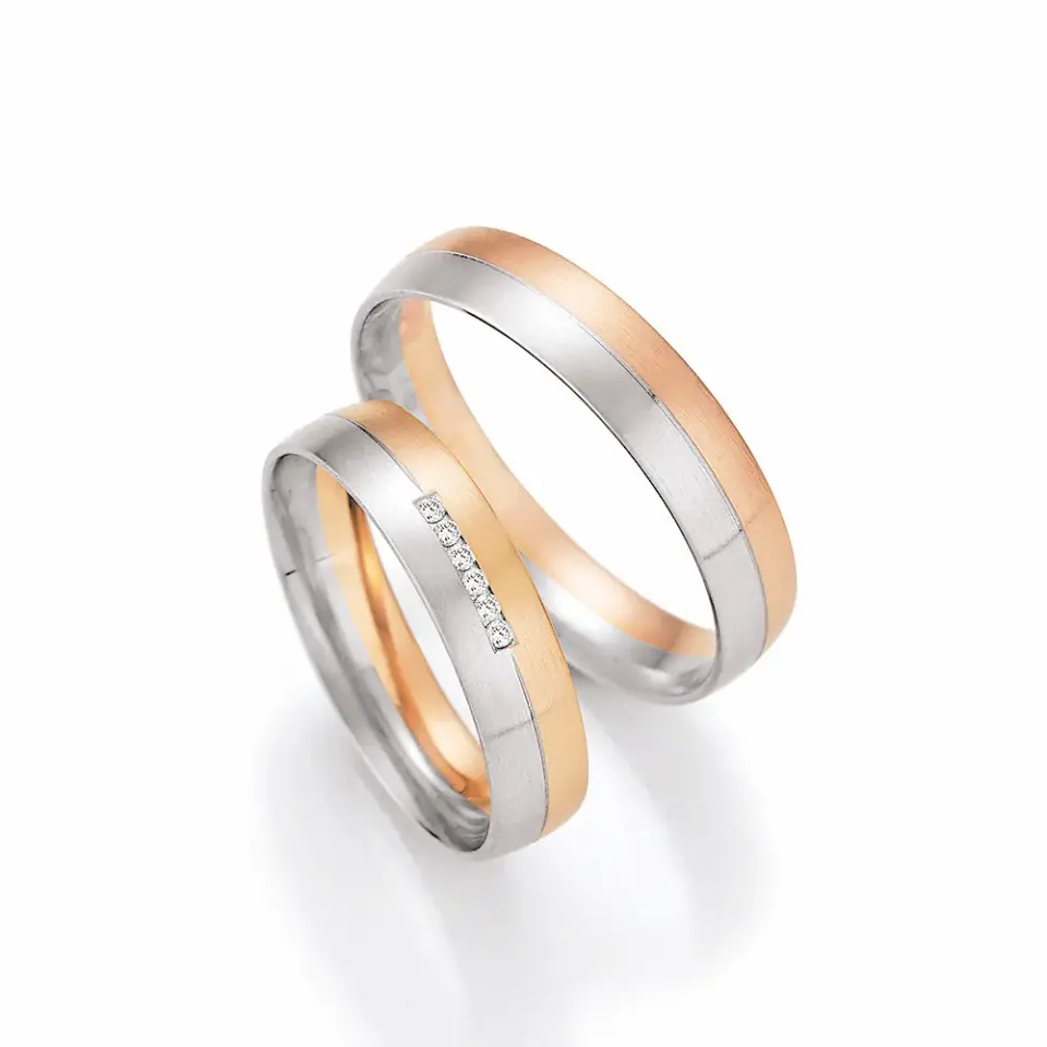 Alianzas de boda de oro blanco y oro rosado con diamantes