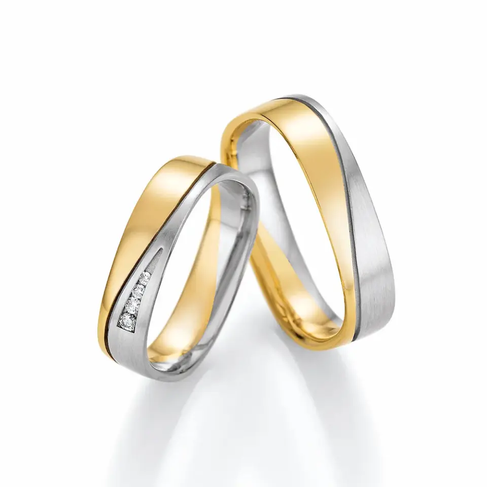 Alianzas de boda de paladio y oro amarillo con diamantes