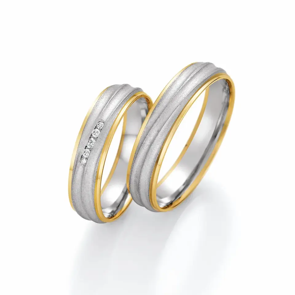 Alianzas de boda de oro amarillo y platino con diamantes