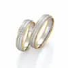 Alianzas de boda de oro amarillo y oro blanco con diamantes