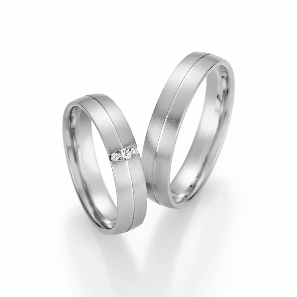 Alianzas de boda de paladio con diamantes