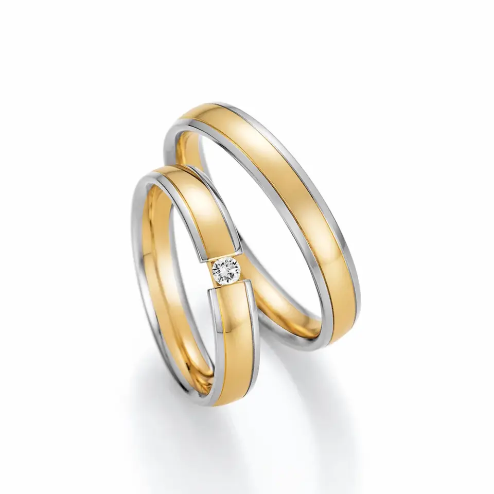 Alianzas de boda de paladio y oro amarillo con diamante