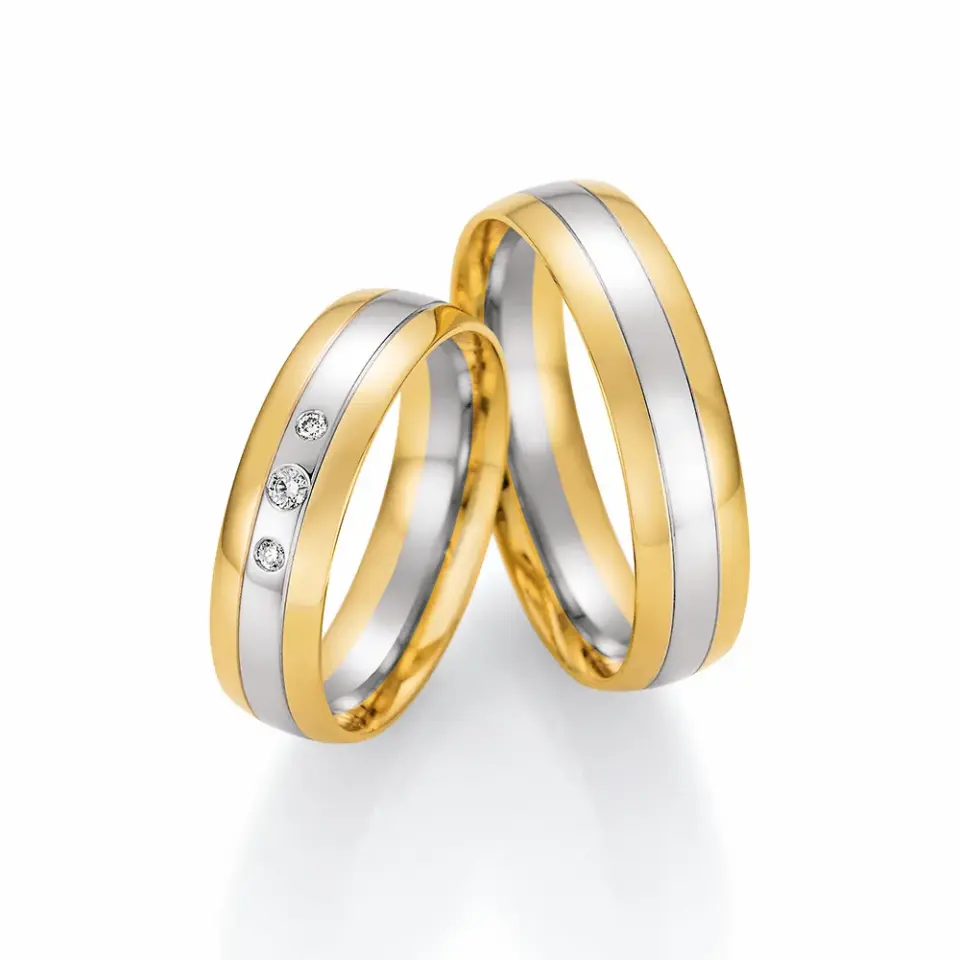 Alianzas de boda de oro amarillo y platino con diamantes
