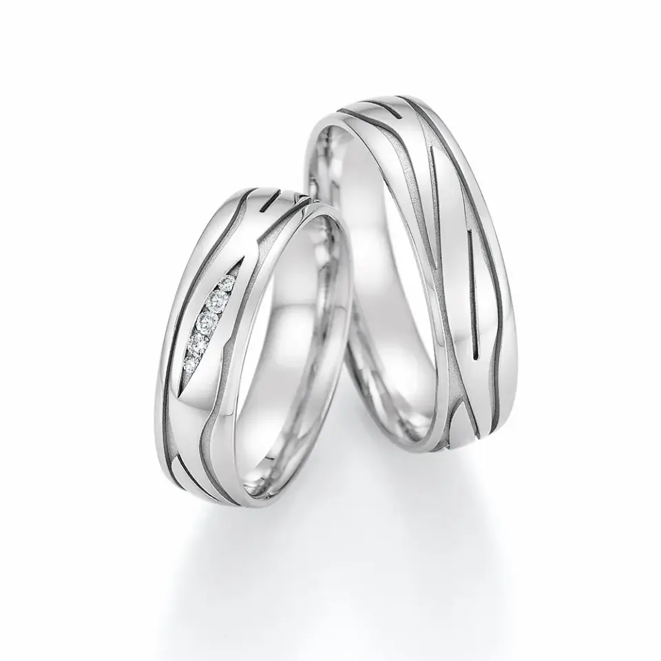 Alianzas de boda de paladio con diamantes