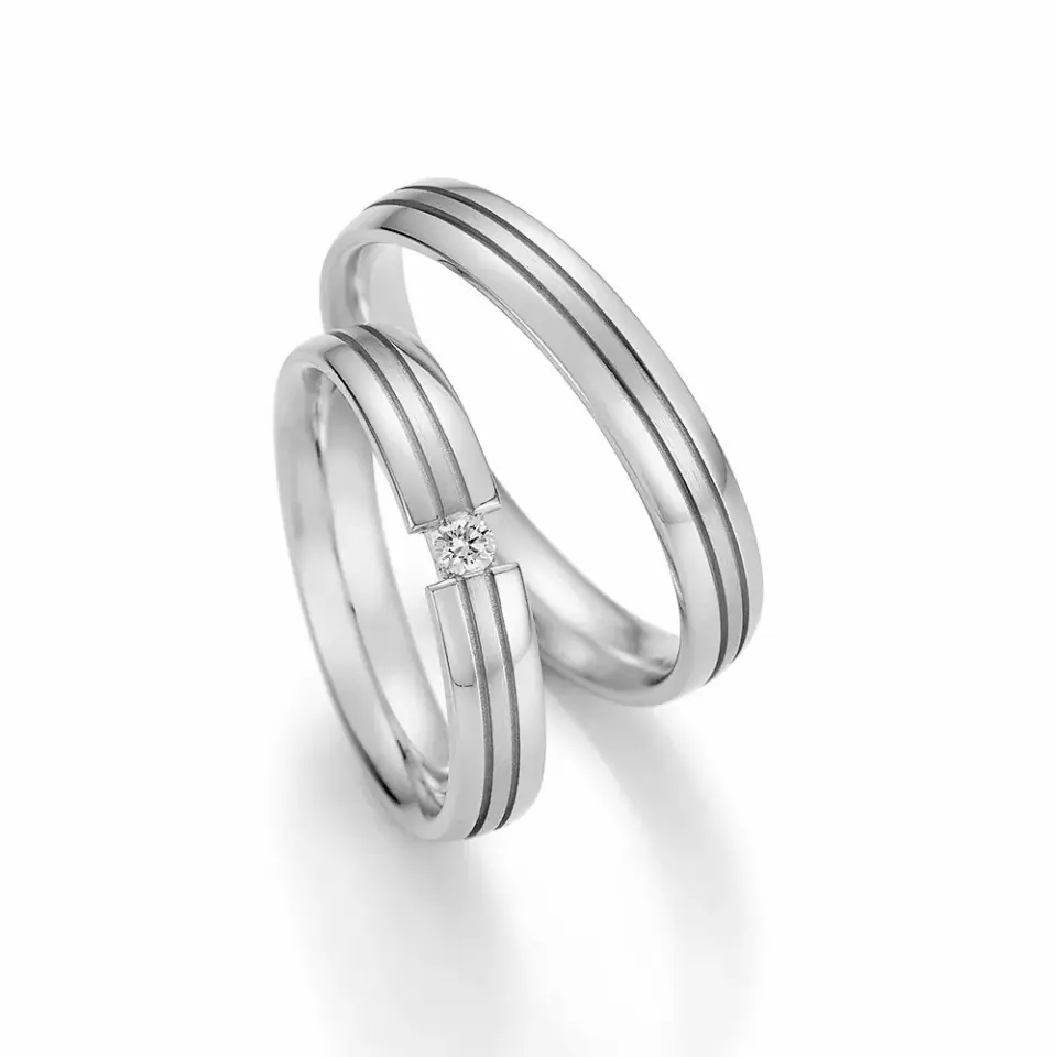 Alianzas de boda de oro blanco con diamante